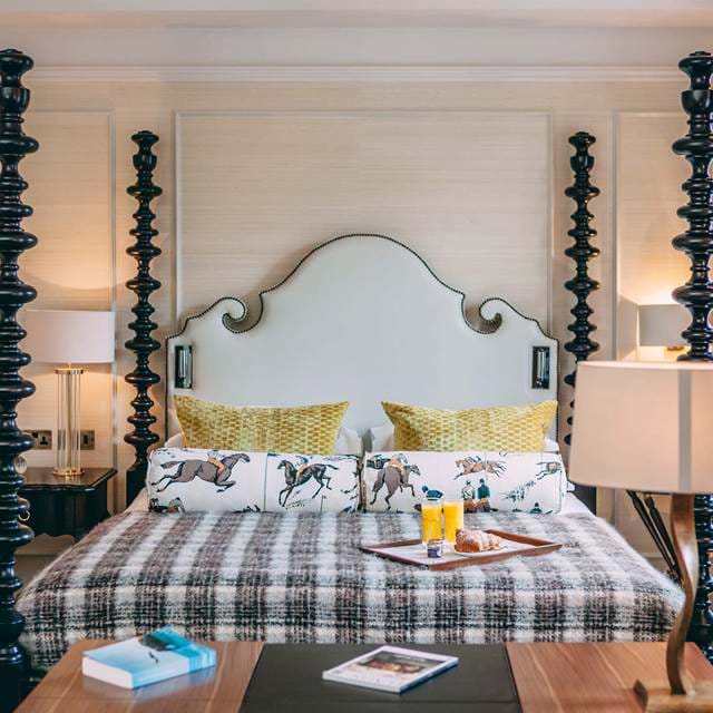 Bed with breakfast inside the Signature Suite at 11 Cadogan Gardens