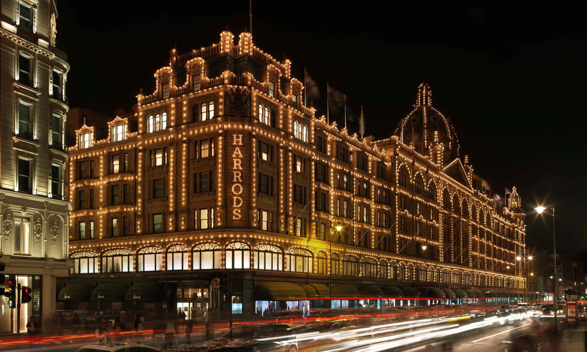 Exterior view of Harrods at night time